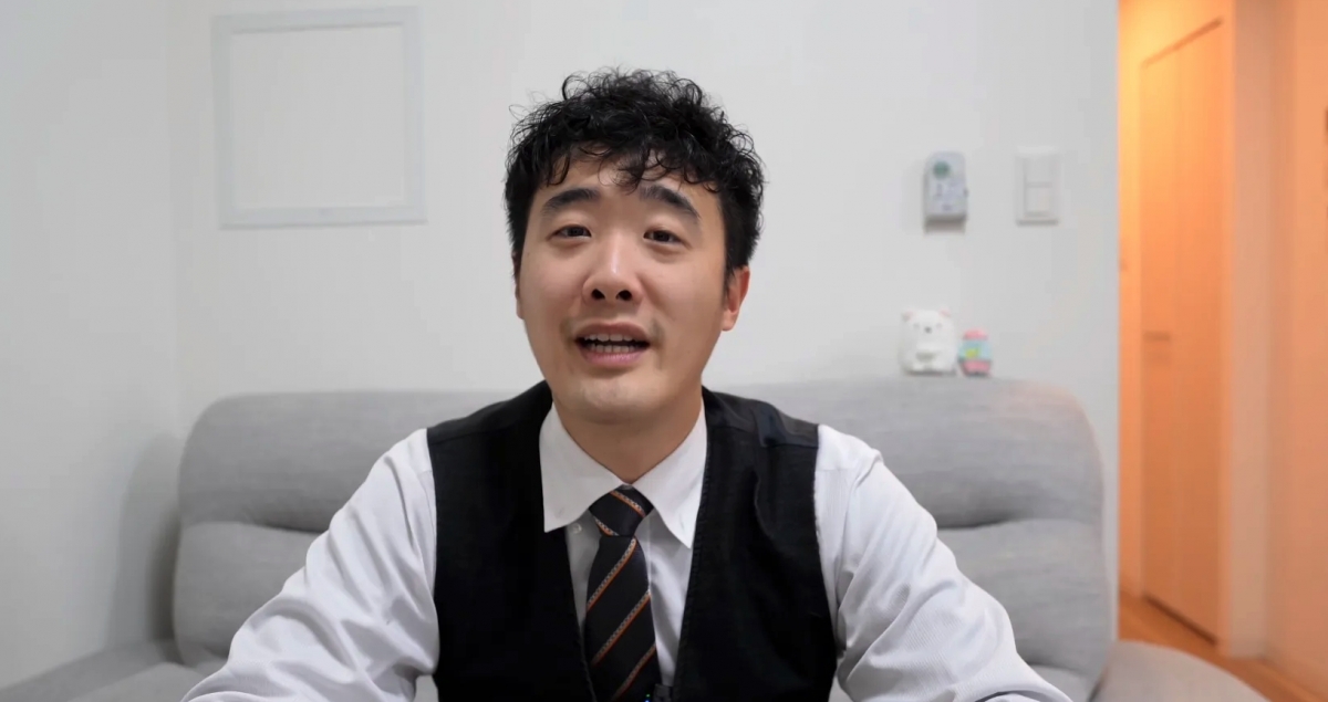 巨人是一位90後移日港人，目前正在當地從事地產經紀的工作，對於日本打工文化深有體會。