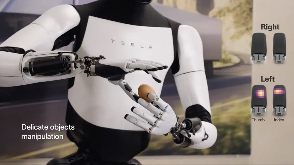 Optimus二代升級後的手部動作變得更加靈活，手指上的觸覺感應可讓機械人處理鷄蛋等易碎物品，包括輕巧拿起鷄蛋再換手輕放至蒸蛋器上。